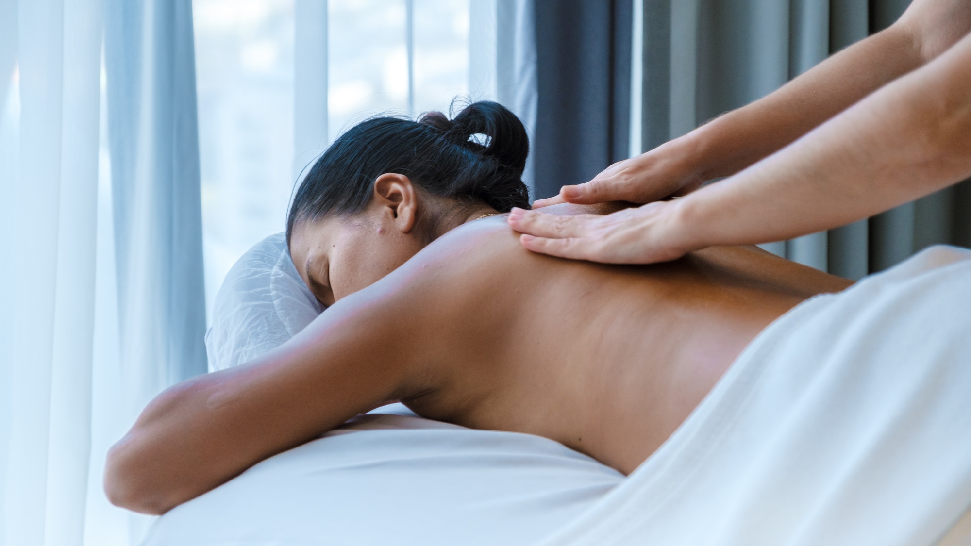 Thai women getting a massage, women get Thai massage in a luxury hotel